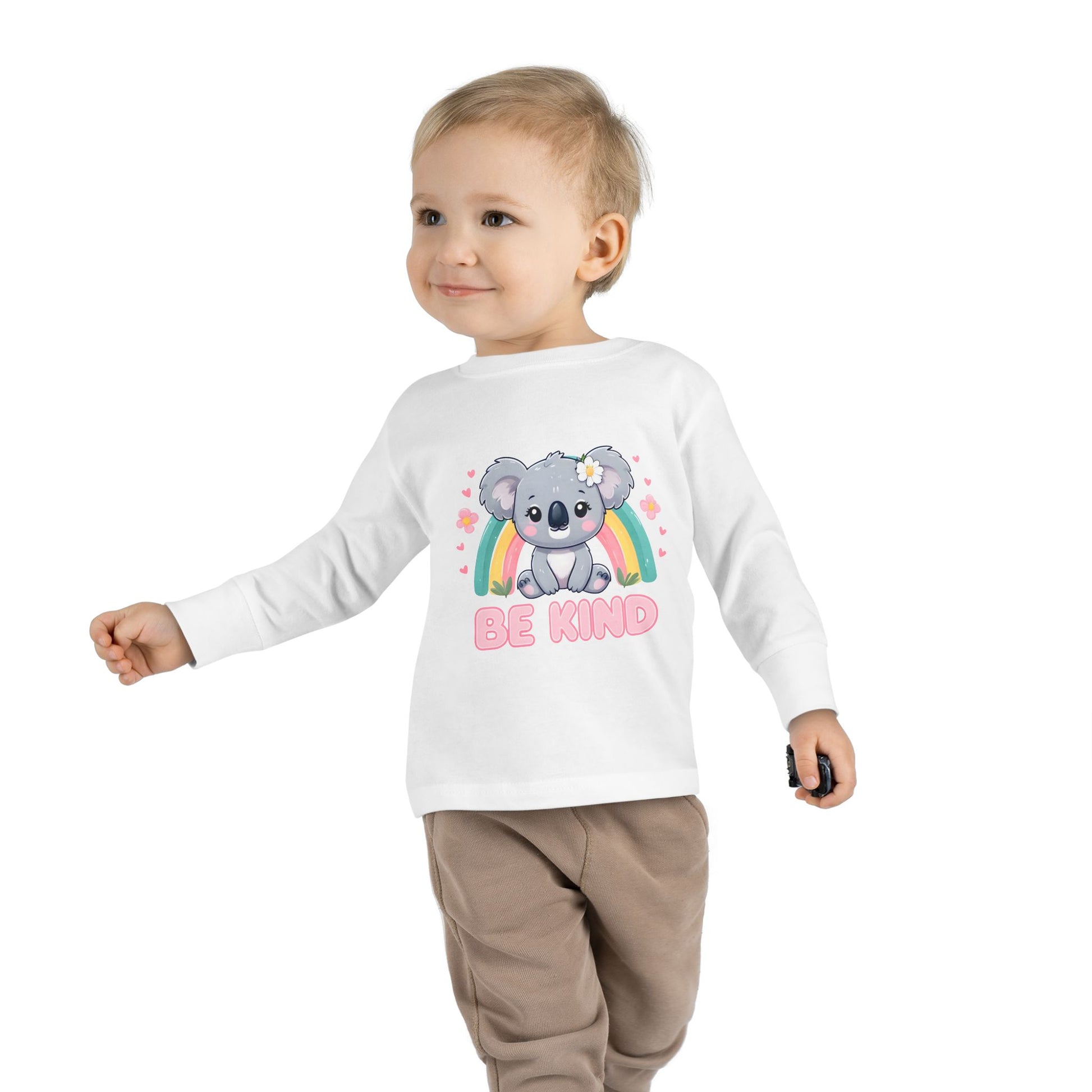 boy wearing white Be Kind Toddler Long Sleeve Tee – Soft & Positive Message Shirt