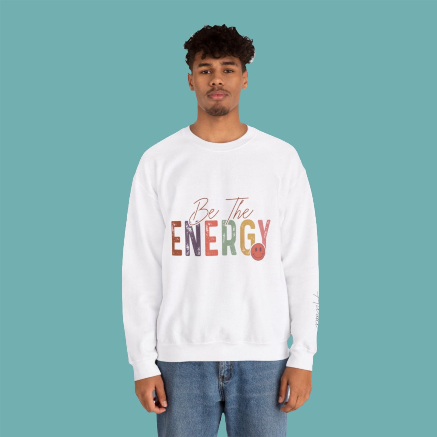 man wearing unisex white be the energy you want to attract sweatshirt