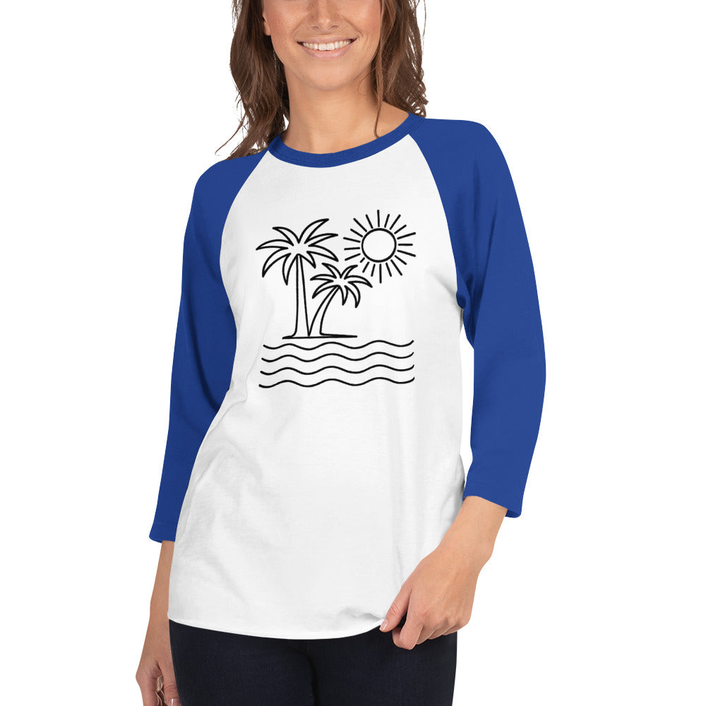 Woman wearing a white and blue baseball shirt with a palm tree and sun design.