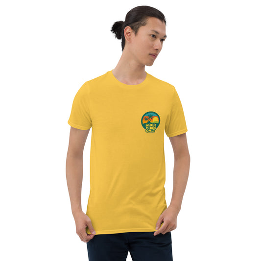 Person wearing a yellow t-shirt with a logo on a white background
