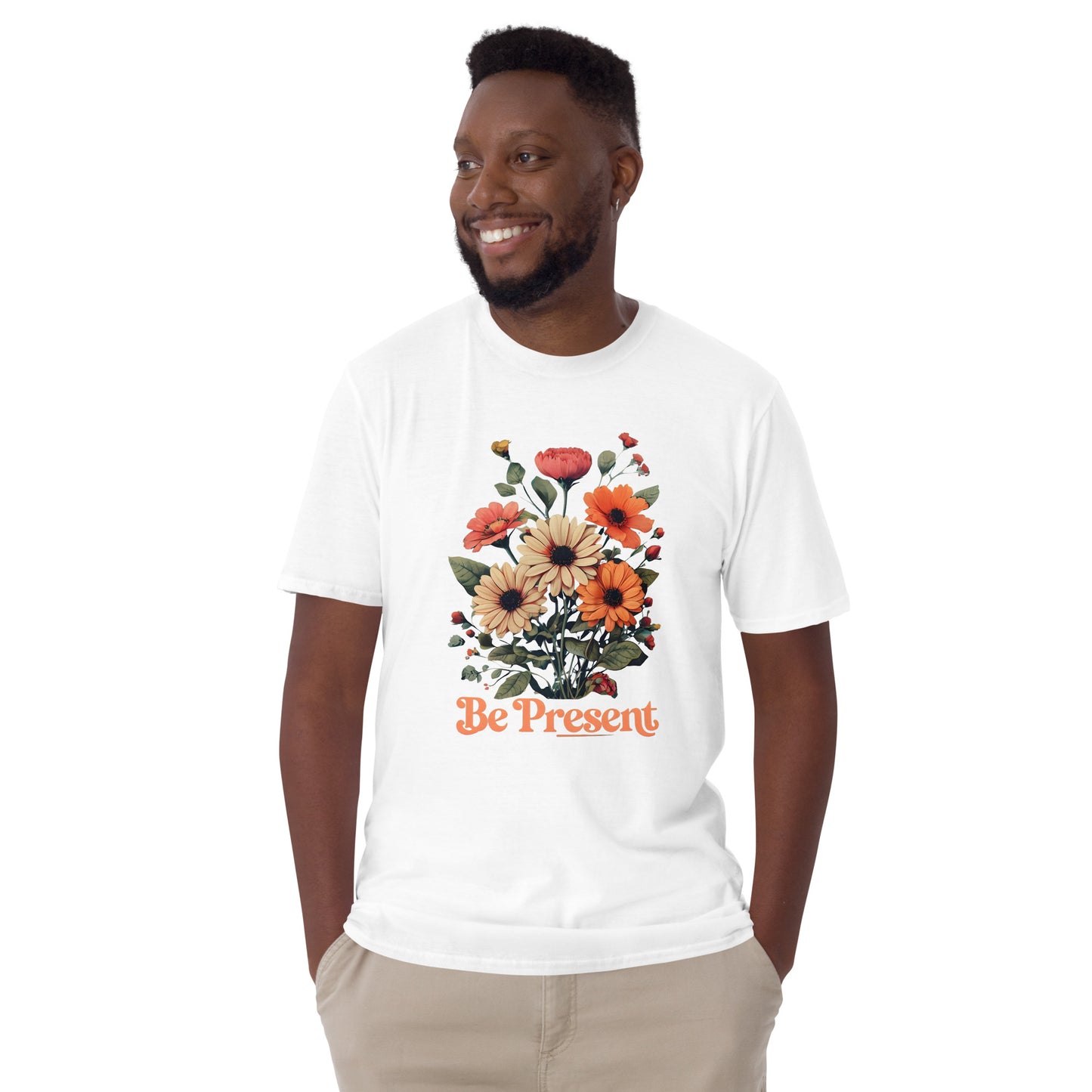 Man wearing a white t-shirt with a floral design and 'Be Present' text on a white background