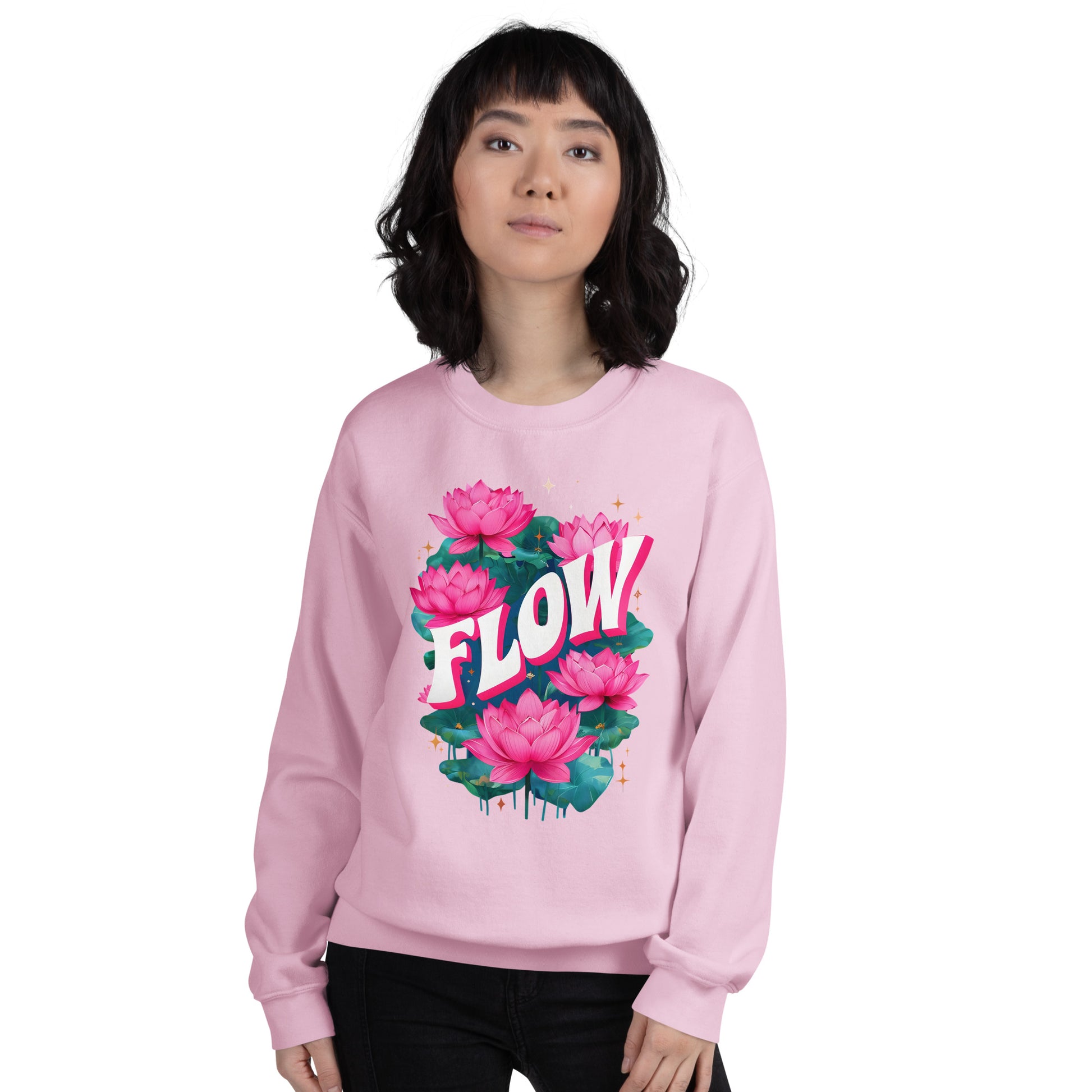 Person wearing a pink sweatshirt with floral design and 'FLOW' text on a white background