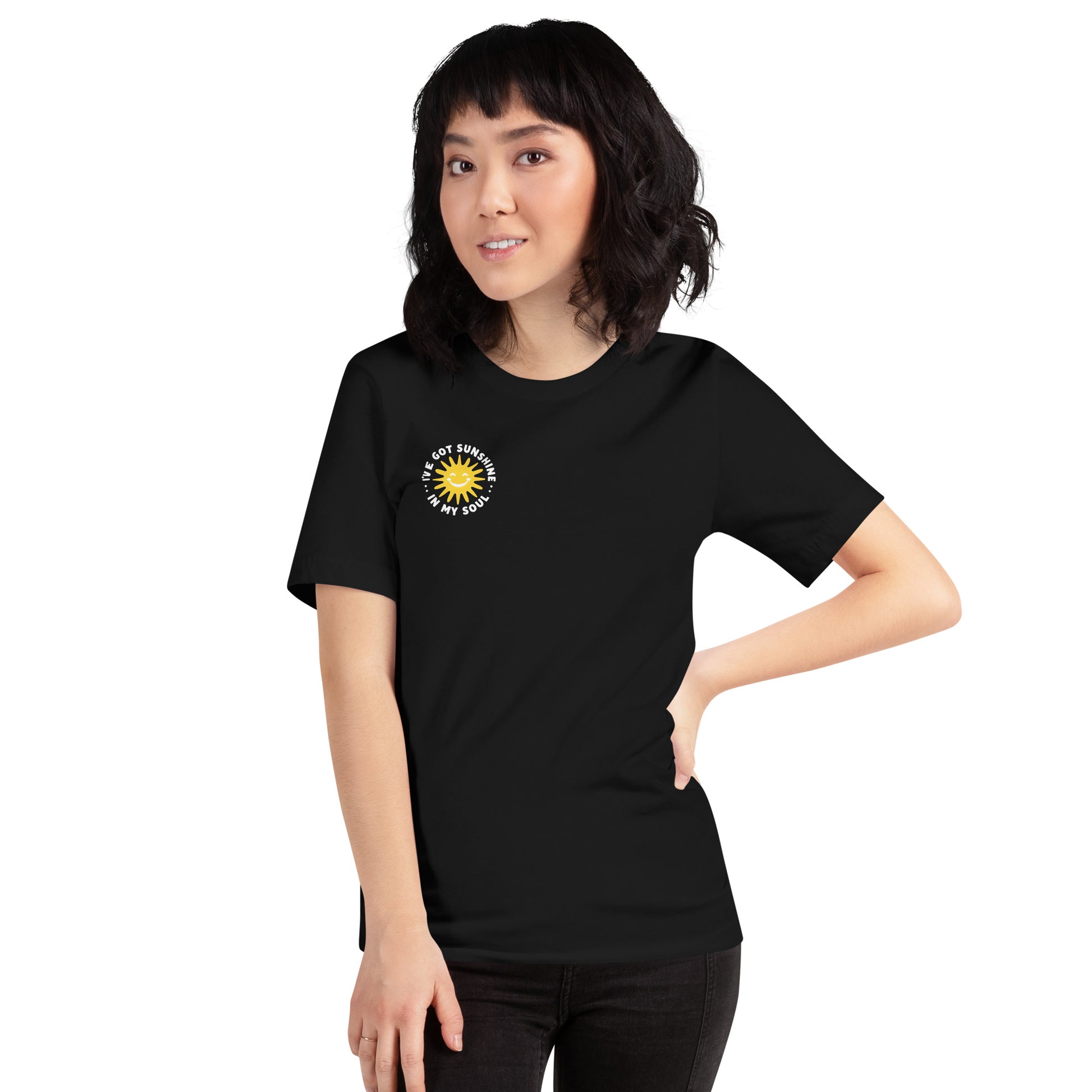 Person wearing a black t-shirt with a I've got sunshine in my soul on a white background