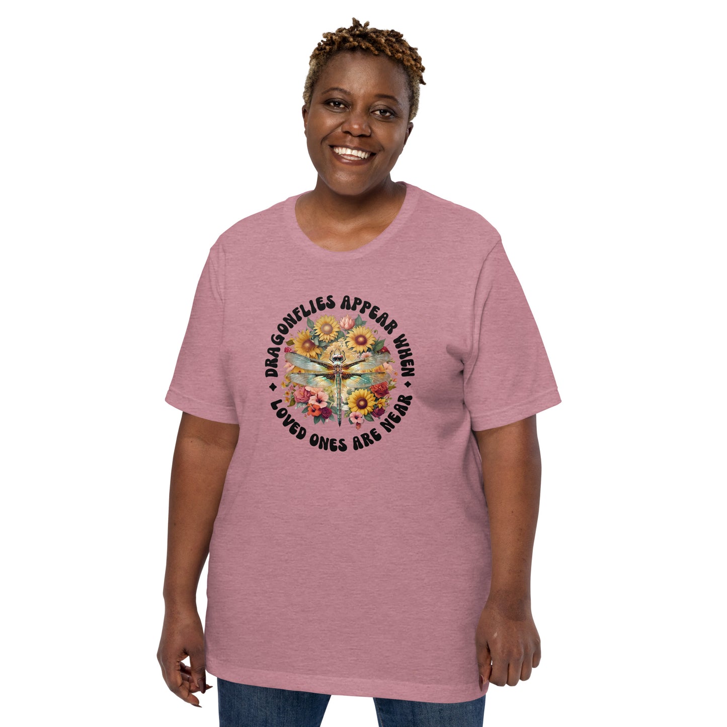 Woman wearing a orchid t-shirt with a colorful graphic and text on a white background